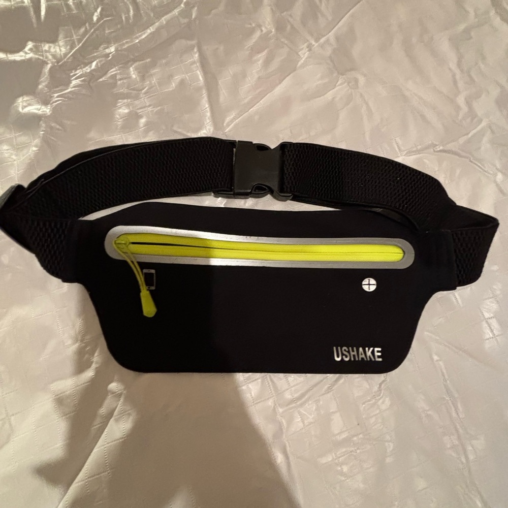 Ushake Athlesure Fanny Pack. With button access and zipper, elastic belt.